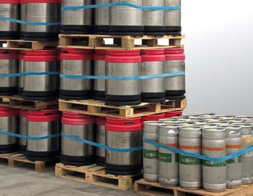Photo of beer canisters secured with rubber pallet bands.