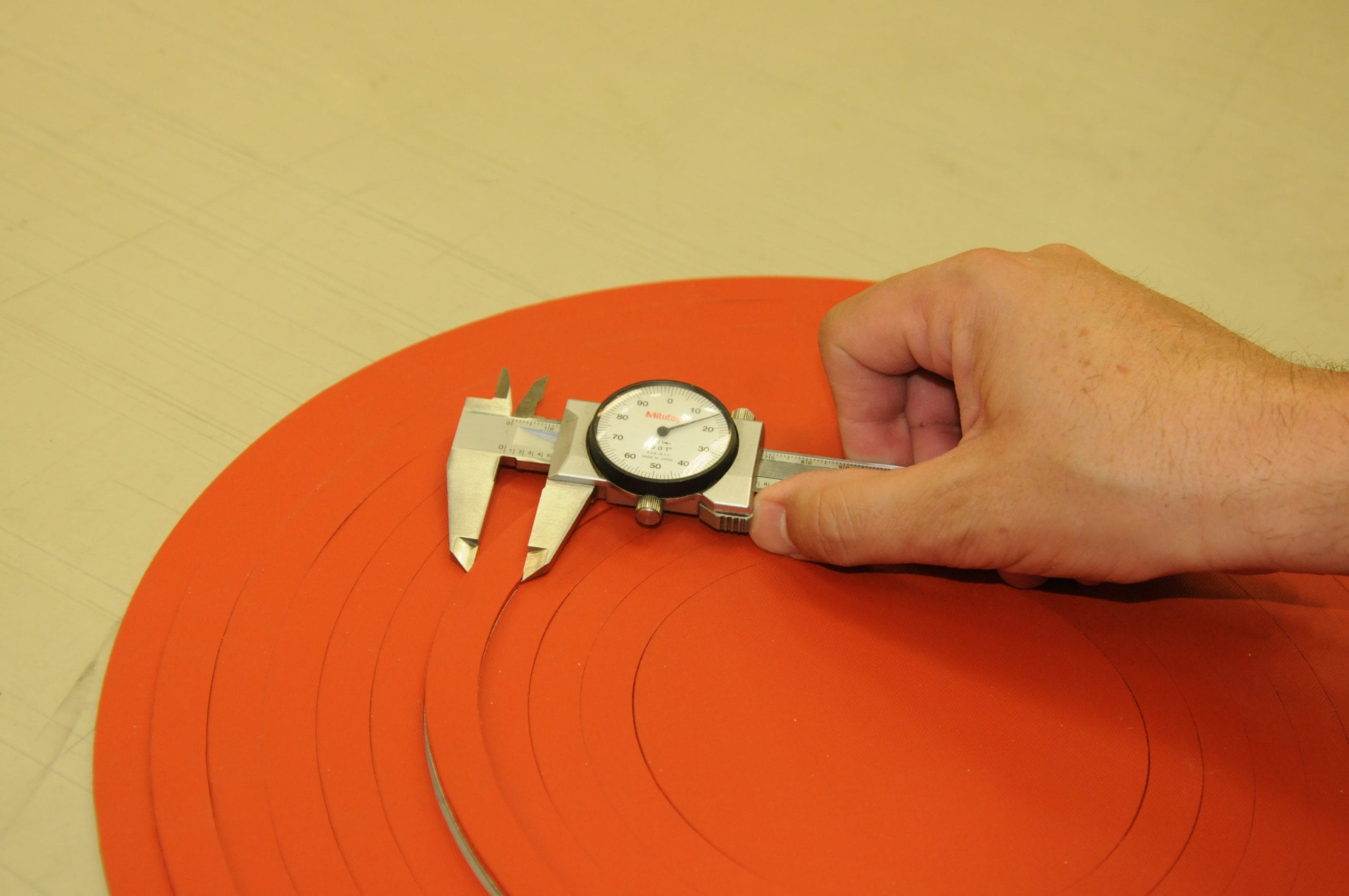 Measuring durometer of tubing with durometer gauge